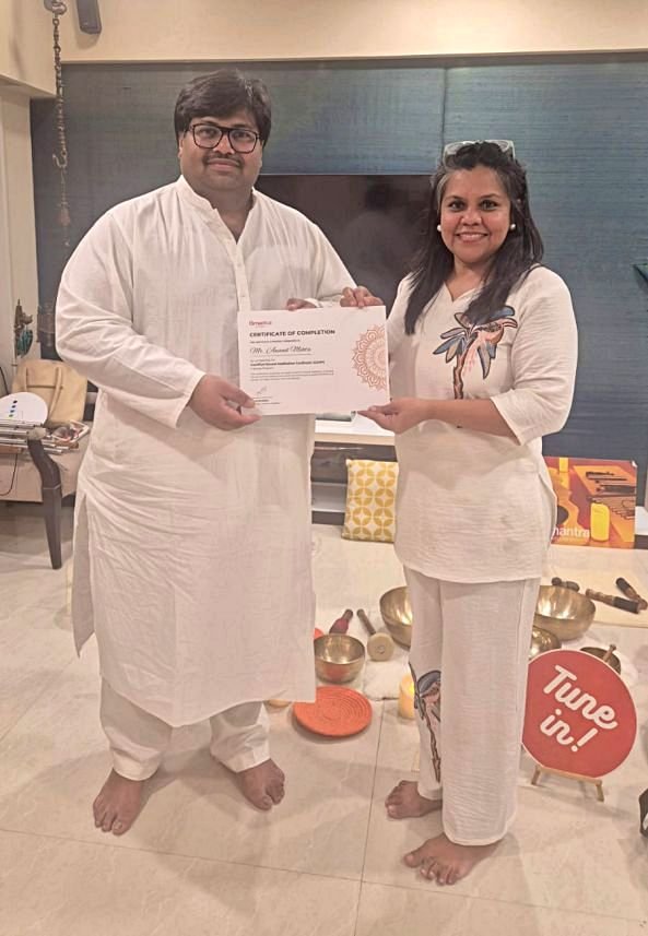 Mr. Anand Mehta receiving the Certified Sound Healing Coach (CSHC) Certificate